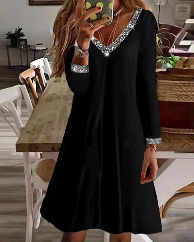 Elegantes Midikleid mit Pailletten und 3/4-Ärmeln